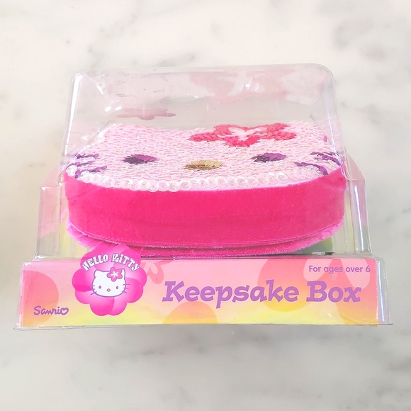 NWT. Hello Kitty's face shape Keepsake box with multi color sparkling design. - Picture 2 of 4